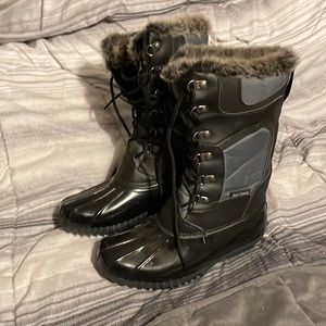 Never worn snow or rain boots